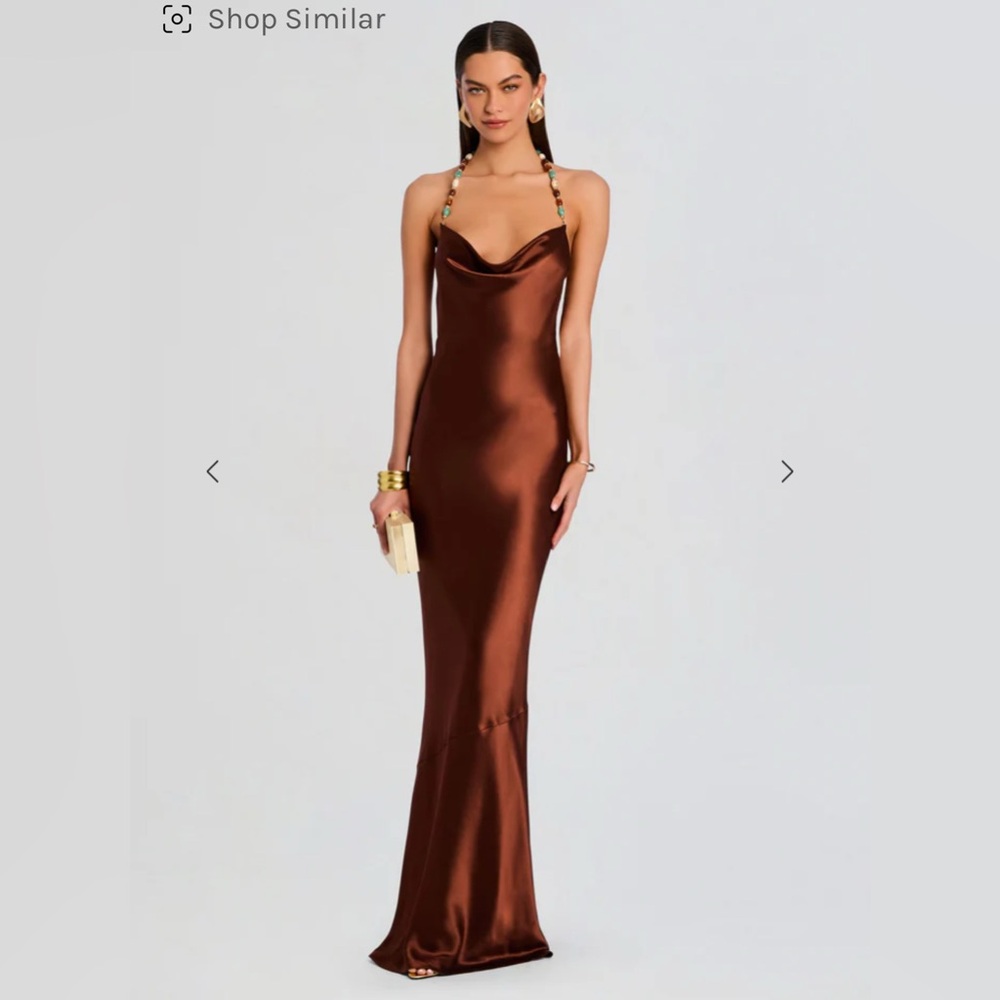 Never worn. Tags still attached.
